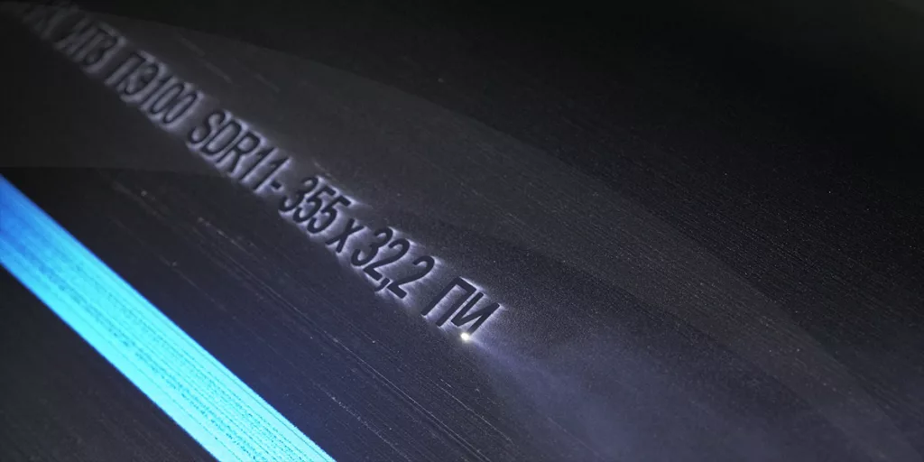 Serial numbers being imprinted with a laser marking machine
